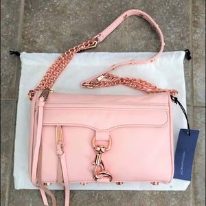Rebecca Minkoff pink quartz cross body bag.